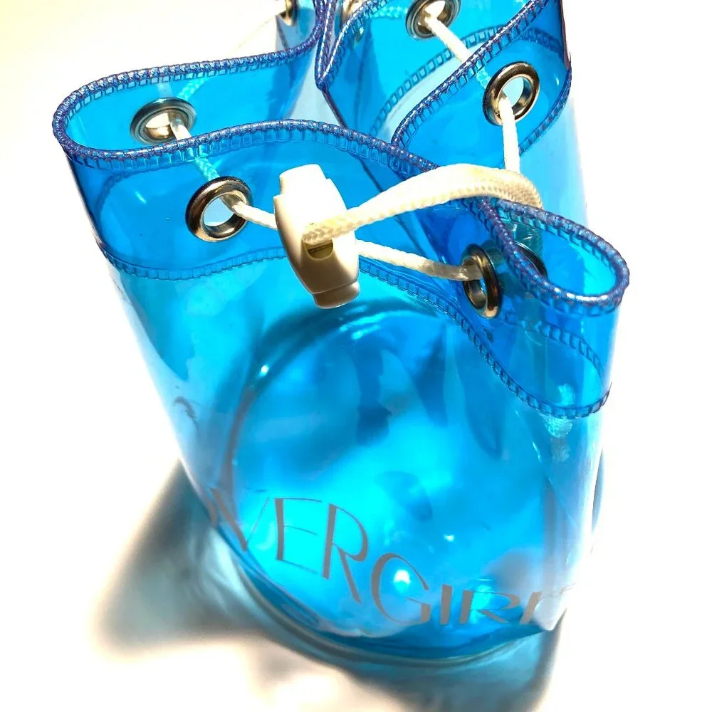 CoverGirl Plastic Duffle Bag with rope closure